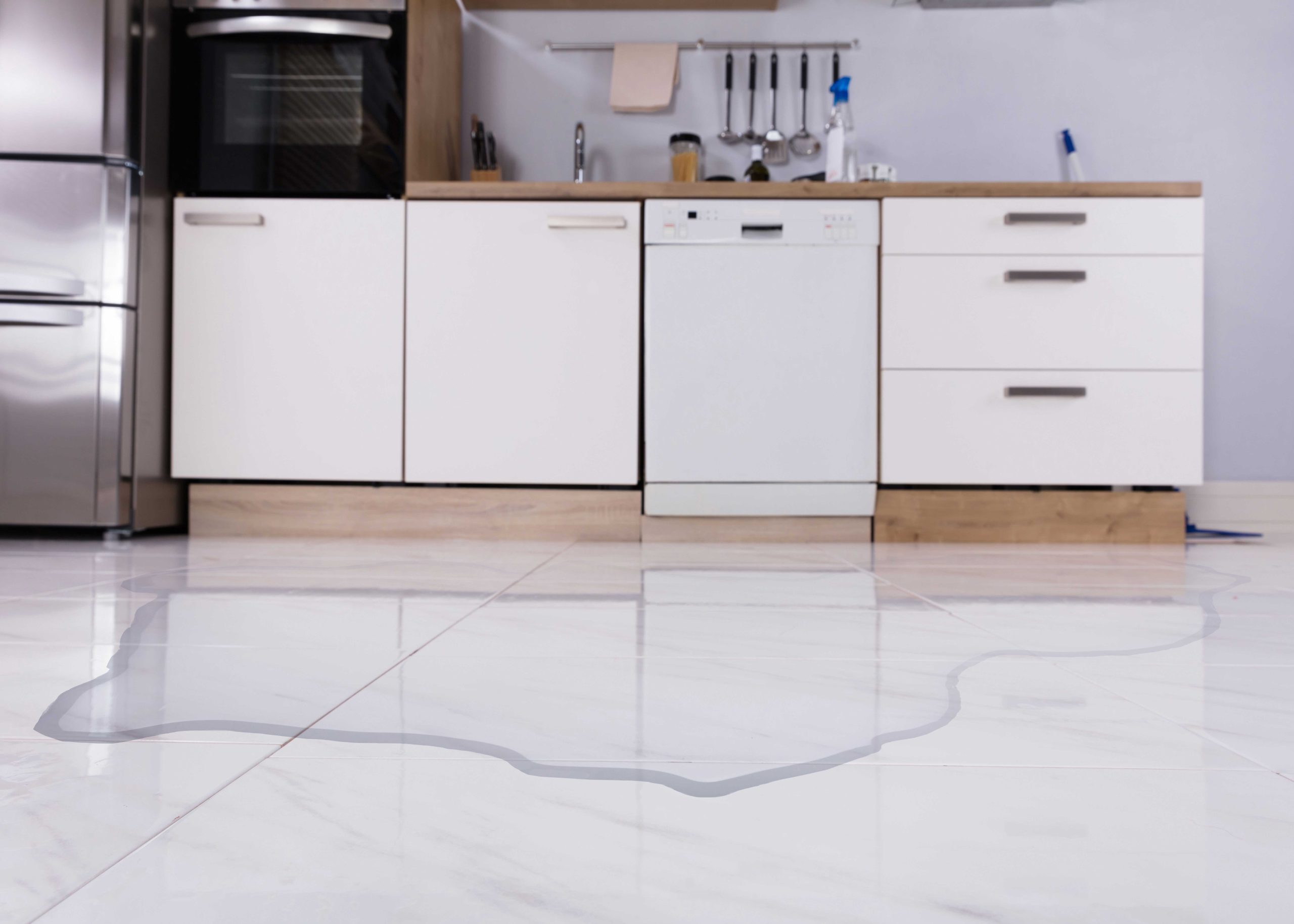 Flood water damage in a kitchen after a storm in an Edgewater, FL home