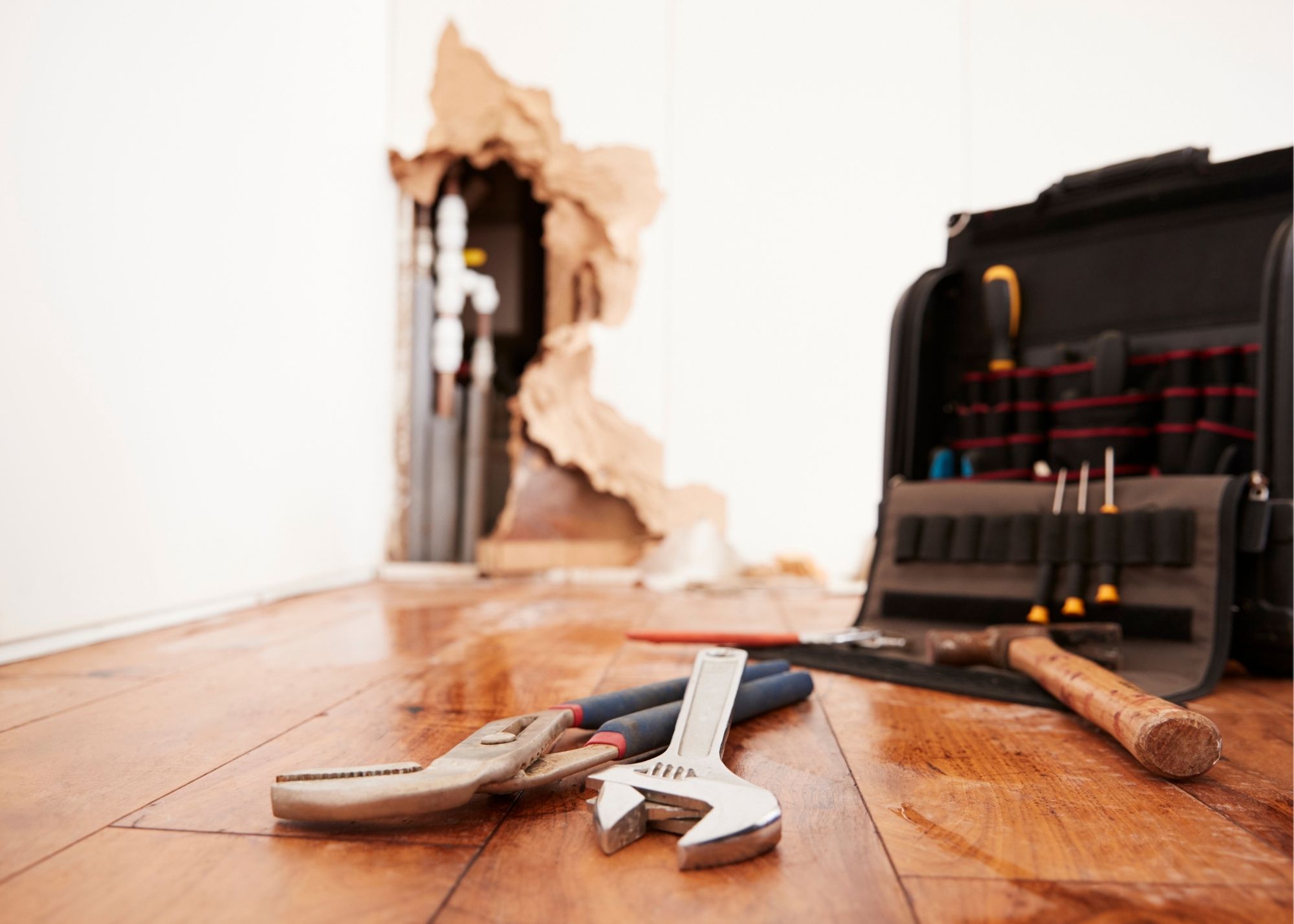 Plumbing repair tools used during sewage backup cleanup in an Edgewater, FL home